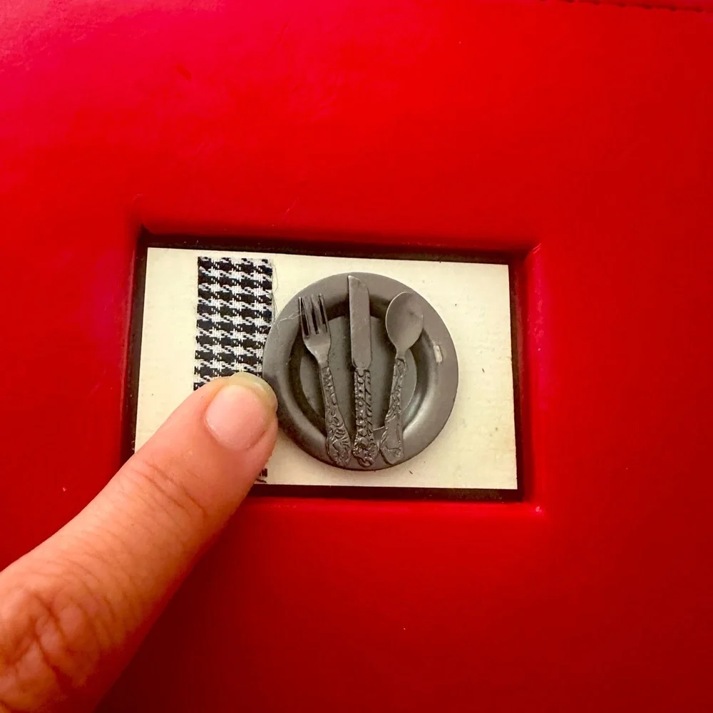 Red Recipe Album with Silver fork, spoon, knife and plate Emblem